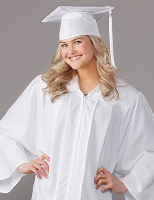 Prestige Senior Photography - Senior girl in white cap and gown on gray background