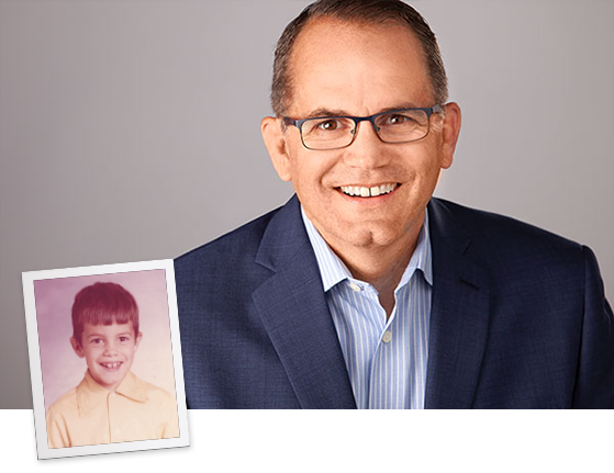 Tom Wargolet Leadership Profile - Headshot with school image