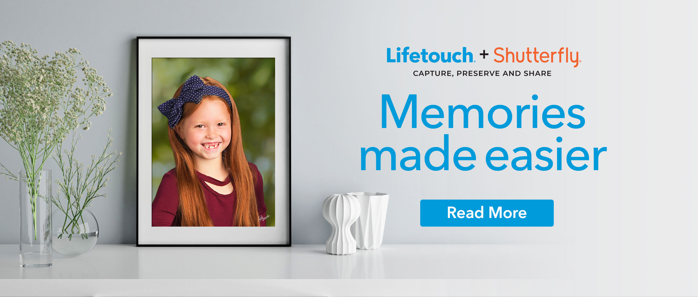 Image of framed school picture on desk. Lifetouch and Shutterfly. Memories made easier.