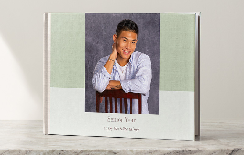 photo book and water bottle in home scene